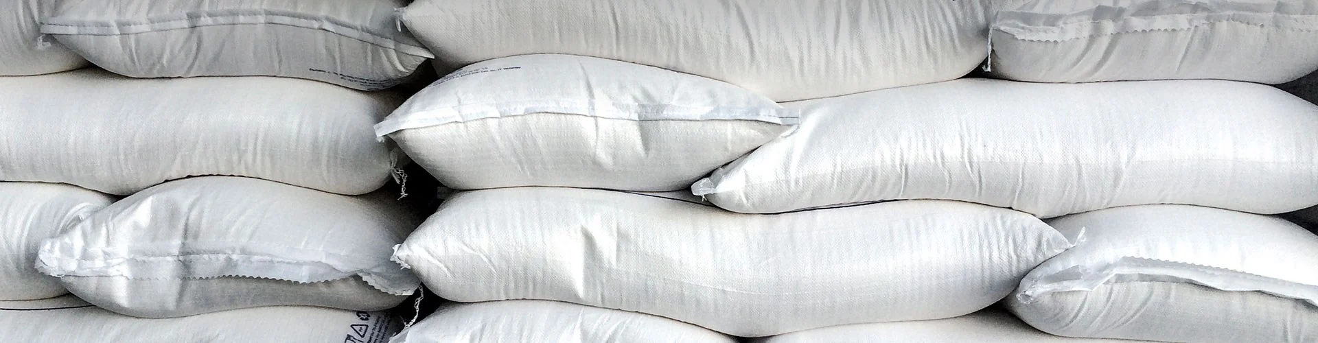 Упакованная продукция на странице российского сахарного бизнеса Sucden. Общая иллюстрация группы.